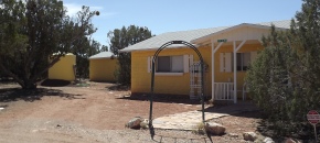 Cute Yellow Concrete Block Cottage